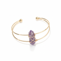 Gold double-wire open cuff bracelet with a purple faceted stone